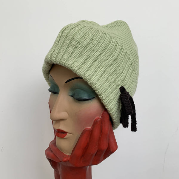 Vintage mint green wool beanie by Miu Miu made in Italy with black bow detail