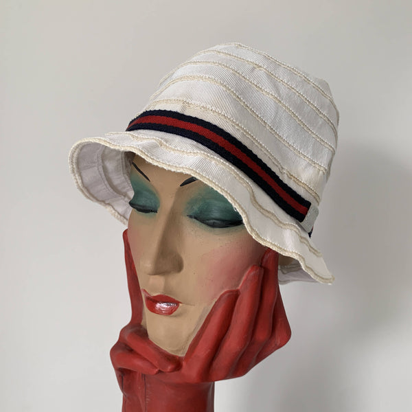 Vintage Gucci white cloche hat with signature stripe ribbon