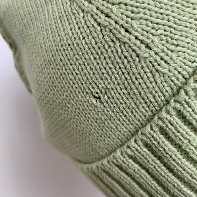 Vintage mint green wool beanie by Miu Miu made in Italy with black bow detail