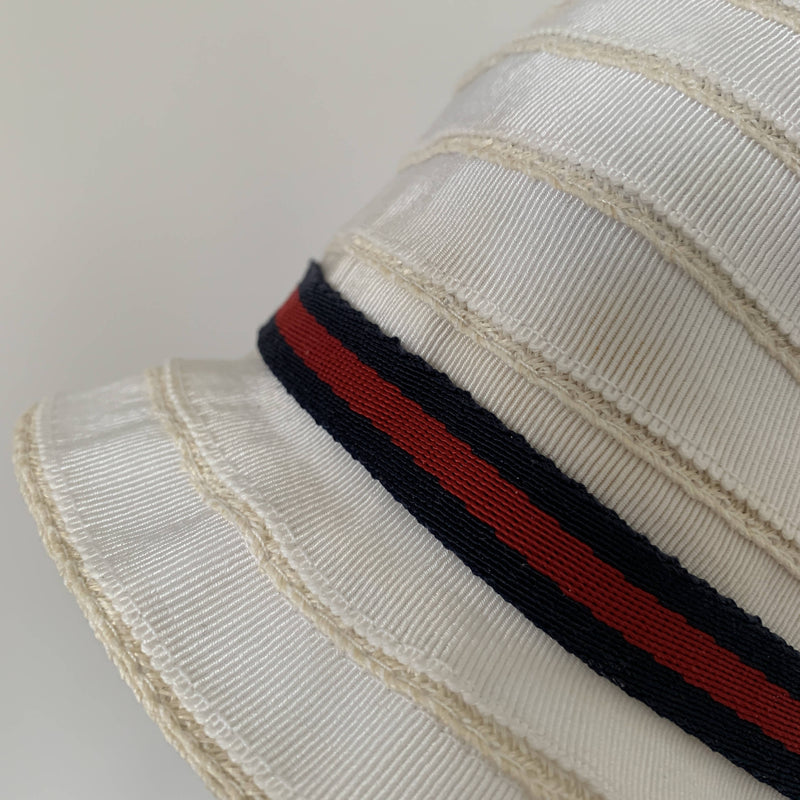 Vintage Gucci white cloche hat with signature stripe ribbon